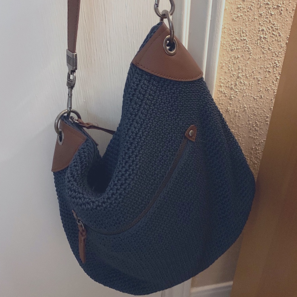 THE SAK  navy crochet with leather trim